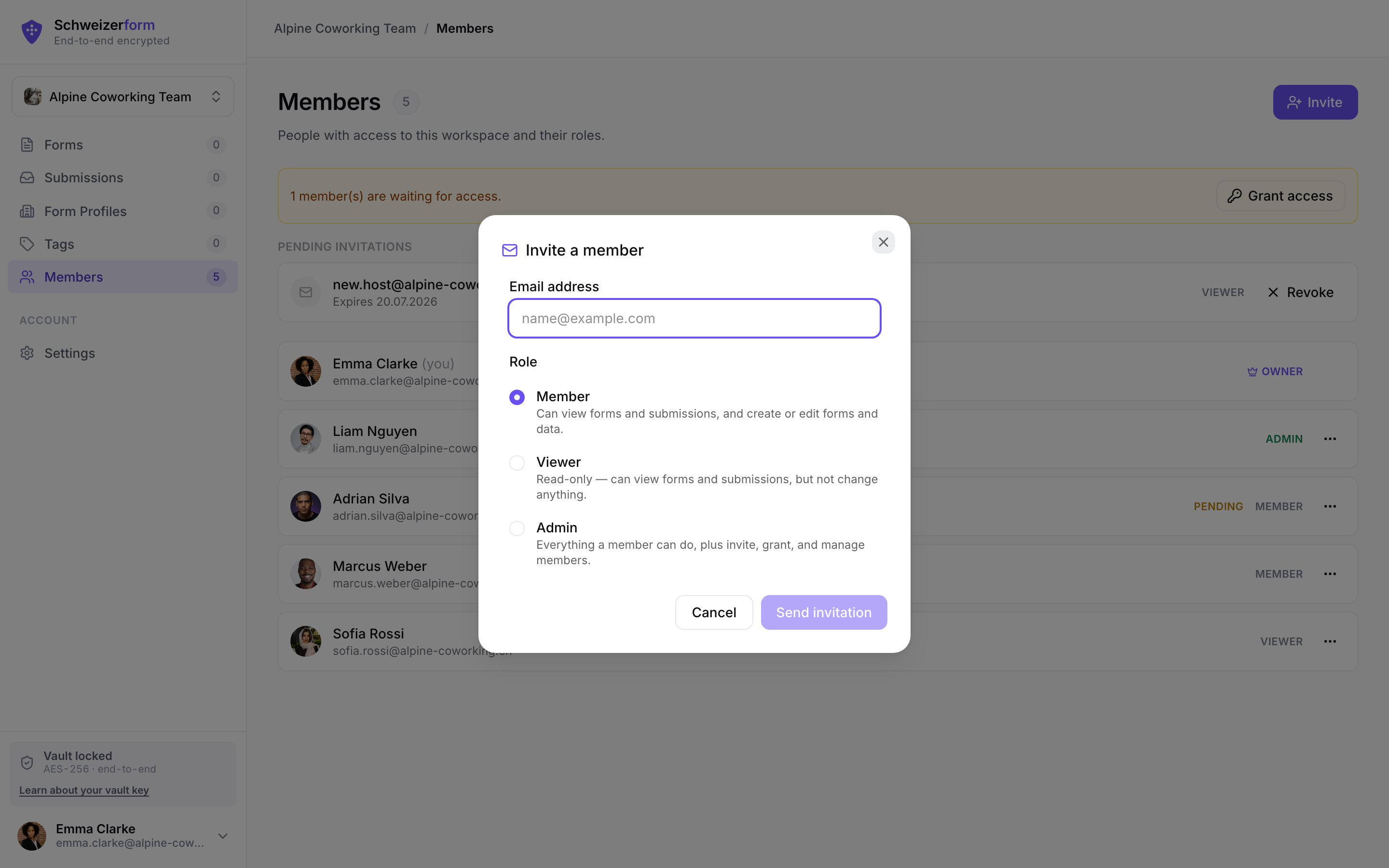 Workspace members table with role chips and the invite modal open